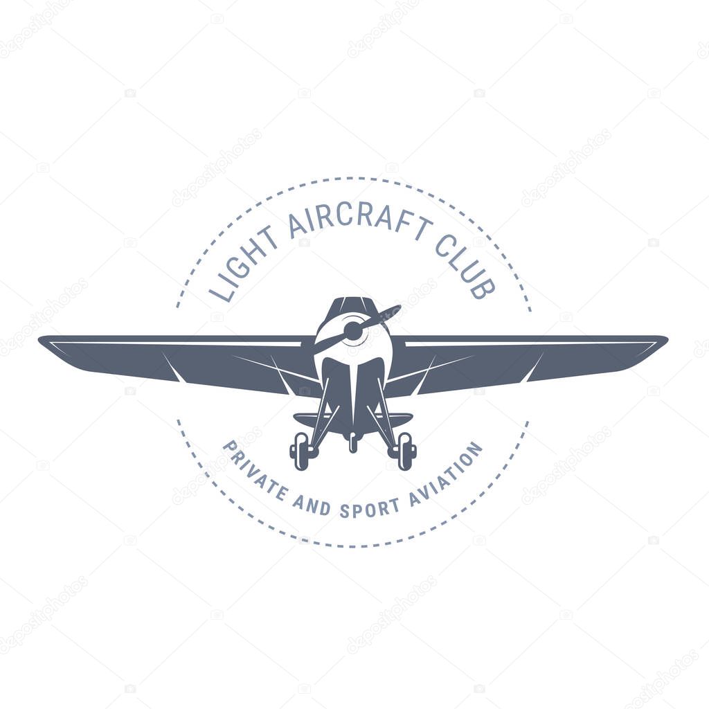 Light aviation emblem with biplane , vintage airplane icon,  propeller aircraft front view logo, vector illustration