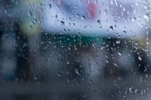 Gocce Pioggia Che Cadono Vetro Sfocature Astratte Immagine Monsonica Della — Foto Stock