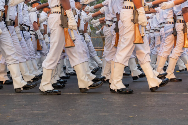 RED ROAD, KOLKATA, WEST BENGAL / INDIA - 21ST JANUARY 2018: Indian armed force Officers are marching past in all white dress, preparing for show for India 's republic day celebarion on 26.01.2018.