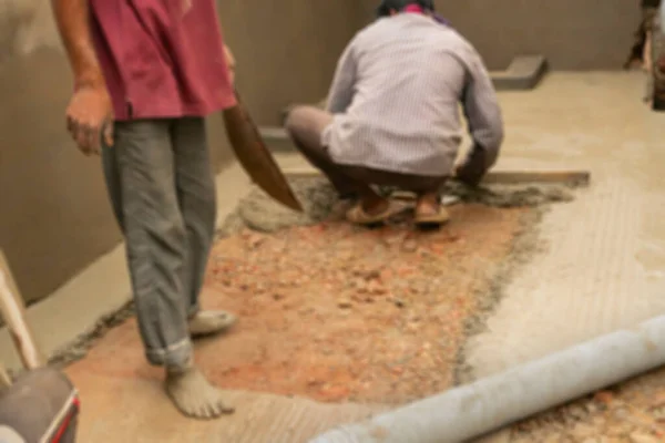 Unscharfes Bild Indischer Bauarbeiter Die Den Boden Manuell Mit Spachtel — Stockfoto