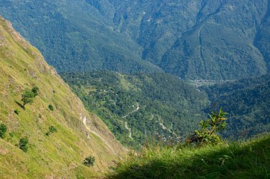View of Himalayan mountain and forest from Tarey Bhir point, tourist spot, Sikkim, India. 'Bhir' means cliff in the local Nepal language,about 10,000 feet long path, a breathtaking view at the edge.