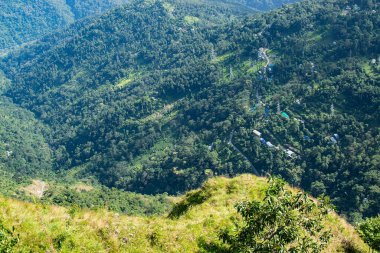 View of Himalayan mountain and forest from Tarey Bhir point, tourist spot, Sikkim, India. 'Bhir' means cliff in the local Nepal language,about 10,000 feet long path, a breathtaking view at the edge.