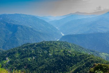 View of Himalayan mountain and forest from Tarey Bhir point, tourist spot, Sikkim, India. 'Bhir' means cliff in the local Nepal language,about 10,000 feet long path, a breathtaking view at the edge.