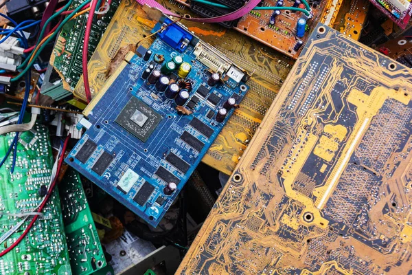 Old computer chip, garbage disposal in a junkyard.