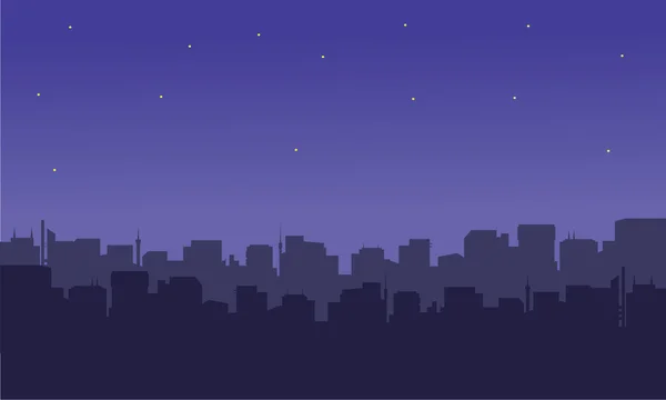 Silueta de la ciudad con una estrella — Vector de stock