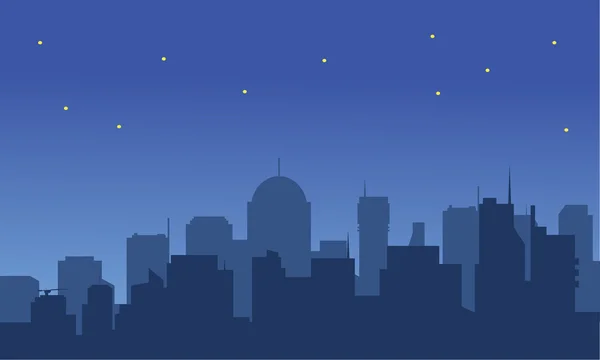 Silhouet van een grote stad bij nacht — Stockvector