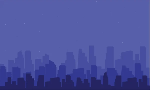 Silueta de la gran ciudad por la noche — Vector de stock