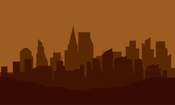 Silhouette de ville sur les collines — Image vectorielle