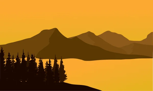 Silhouet van berg bij zonsondergang — Stockvector