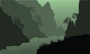 Uçuruma arasında nehir silüeti