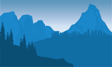 dağda şehir silüeti