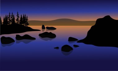 Gün batımında Beach rock siluet ile