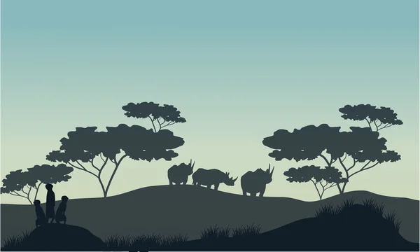 Силуэт сурикатов и носорогов в Саванне — стоковый вектор