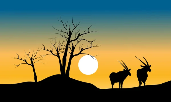 枯树和羚羊的剪影 — 图库矢量图片