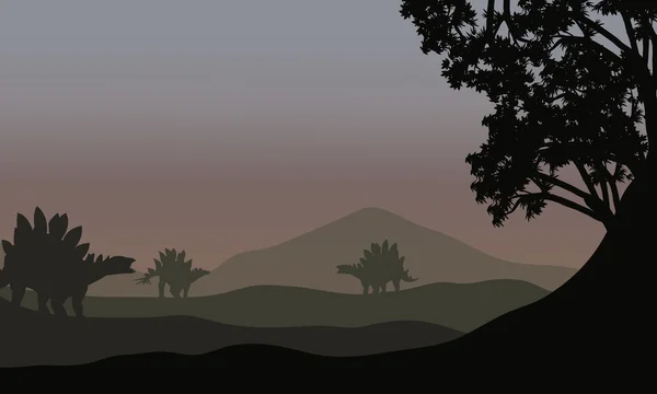 Silhouette von Stegosaurus auf Feldern — Stockvektor