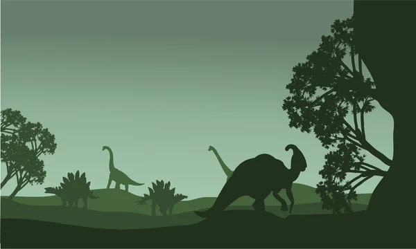 Silhouette de parasaurolophus et stégosaurus — Image vectorielle