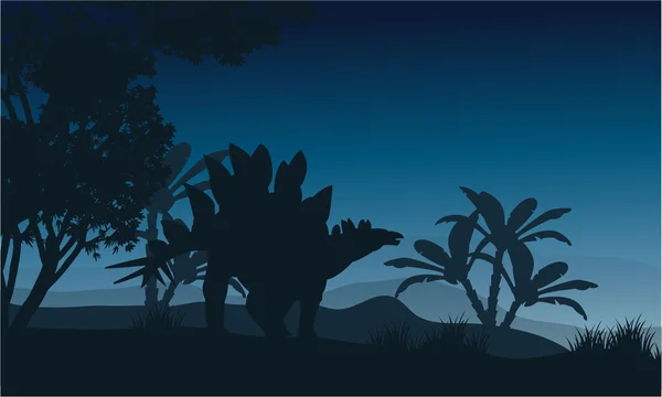 Silhouette eines Stegosaurus auf Feldern — Stockvektor