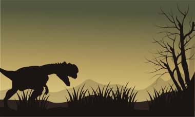 Bir dilophosaurus Hills silüeti