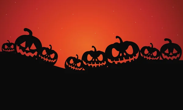 Silueta de calabazas de halloween — Vector de stock