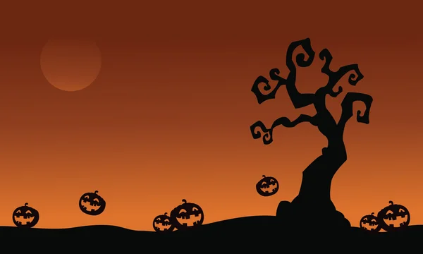 Calabazas de Halloween y árbol seco — Vector de stock