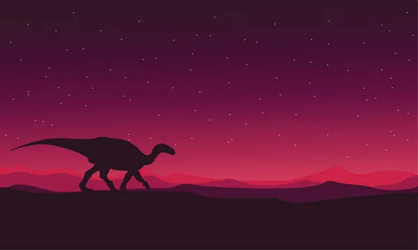 Landscape Iguanodon silhouettes vector — Stock Vector