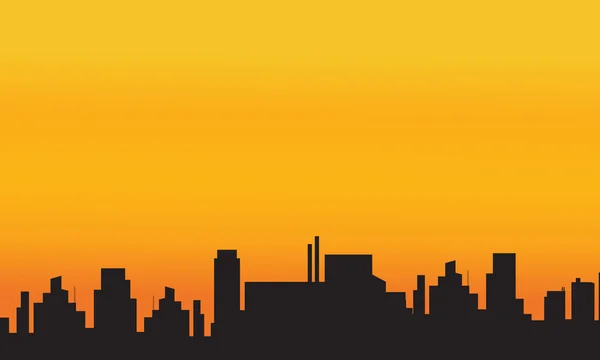 Orange milieux silhouettes de ville — Image vectorielle