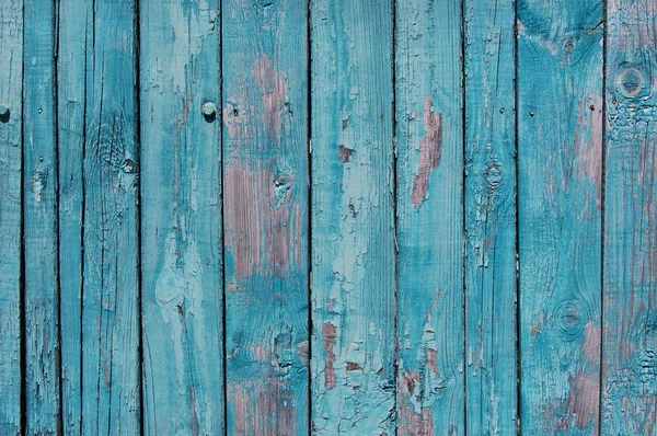 Kék fa deszka repedt festékkel — Stock Fotó