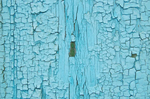 Egy fából készült fal repedt festék — Stock Fotó