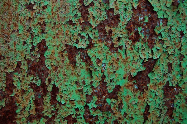 Rissige Farbe auf metallischem Hintergrund — Stockfoto