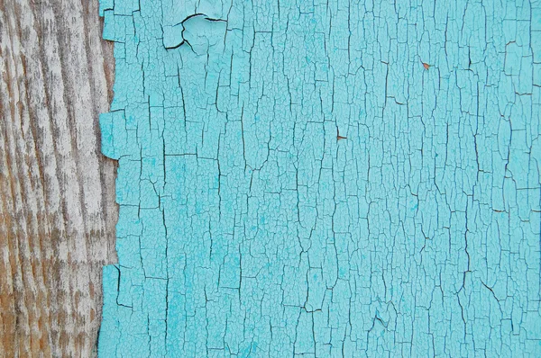 Φως μπλε ραγισμένα χρώμα σε ένα ξύλινο τοίχο — Φωτογραφία Αρχείου