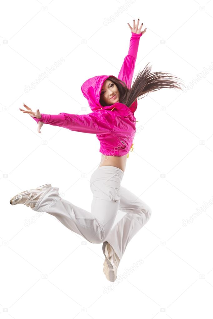 Young modern flexible hip-hop dance girl mid jump. 