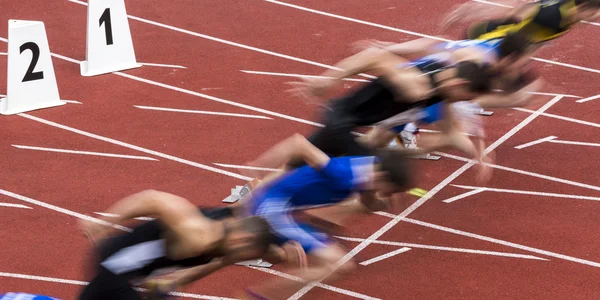 Sprint start in track — Stock Photo, Image