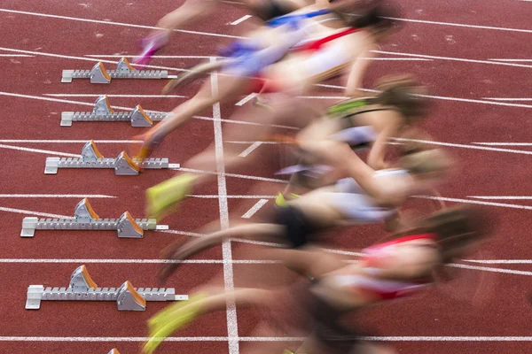 Sprint start in track — Stockfoto