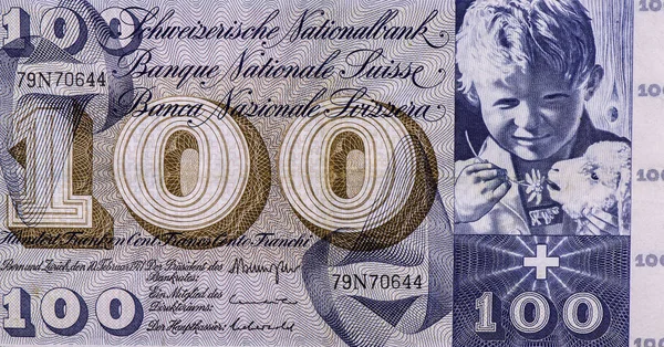 男孩的头在右上角 头戴羊绒 1954 1961年瑞士面额100法郎钞票 — 图库照片