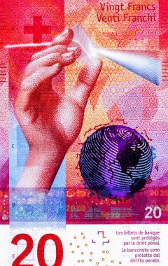 Işığın çeşitli renklere dağılması için bir ışık demetine prizma tutan çocuksu bir sağ el. Globe, İsviçre 'den Portre 20 Frank 2016 Hibrit Polimer Banknotlar.