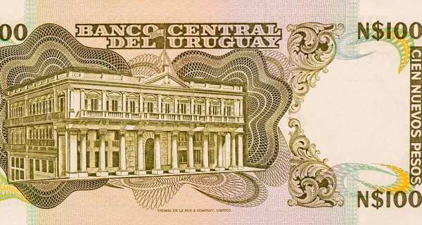埃斯特韦斯宫 政府大厦 位于蒙得维的亚独立广场 建筑师 Manoel Castel 乌拉圭的肖像100比索1989年钞票 — 图库照片