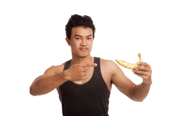 Muscular asiático hombre punto a banana — Foto de Stock