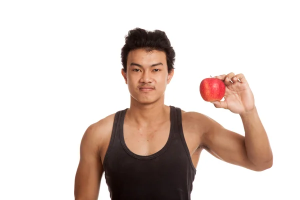 Muskulöser asiatischer Mann mit rotem Apfel — Stockfoto