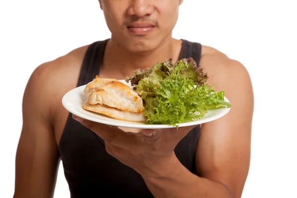 Primer plano muscular asiático hombre con limpia comida — Foto de Stock