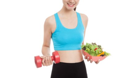 Dumbbell ve salata ile Asya sağlıklı kız