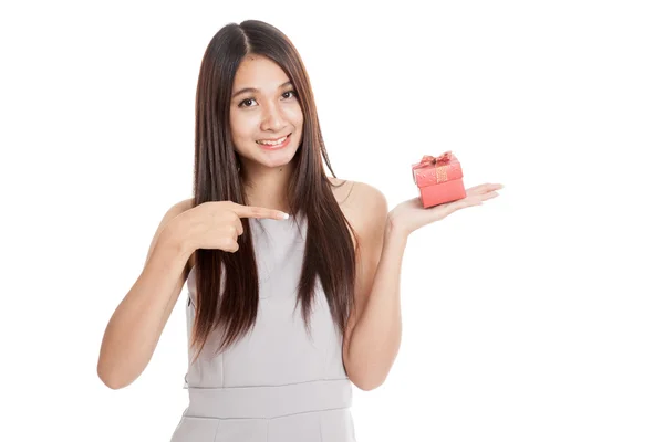 Beautiful young Asian woman with red gift box — Stock Photo, Image