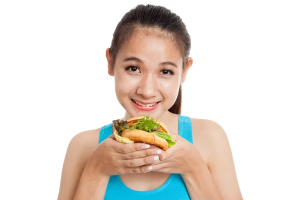 Hermosa chica sana asiática disfrutar de comer hamburguesa — Foto de Stock
