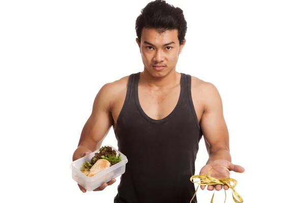 측정 테이프 및 깨끗 한 음식으로 근육 아시아 남자 다이어트 — 스톡 사진