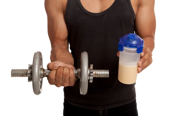 Muscular Asian man with dumbbell and whey protein shakes — Stock Photo, Image
