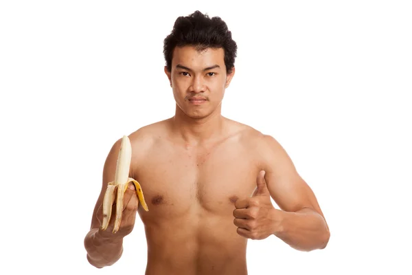 Musculoso asiático hombre con plátano espectáculo pulgares arriba — Foto de Stock