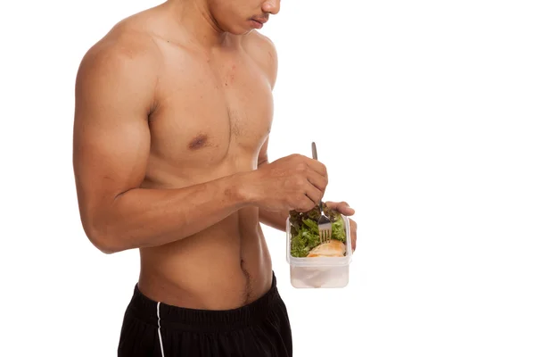 Fuerte muscular asiático hombre con limpia comida — Foto de Stock