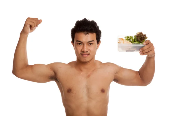 Сильный мускулистый азиат с чистой едой — стоковое фото