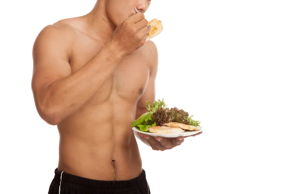 Fuerte muscular asiático hombre con limpia comida — Foto de Stock