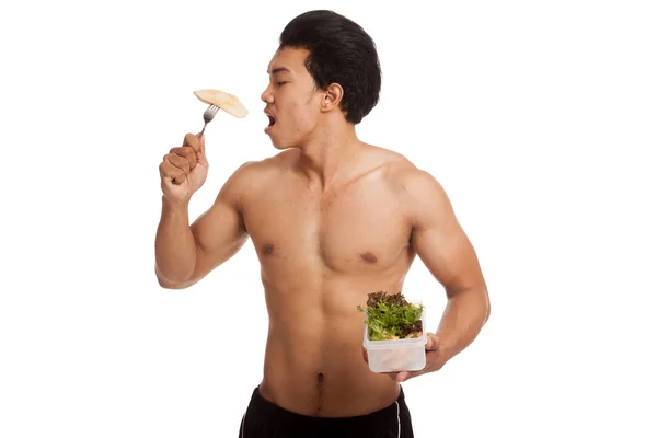 Fuerte muscular asiático hombre con limpia comida — Foto de Stock