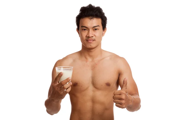 Musclé asiatique homme pouces vers le haut avec du lait de soja — Photo